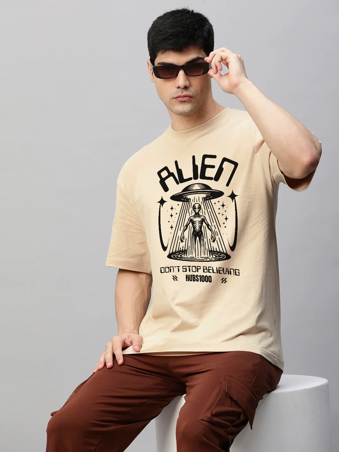 STOP BELIEVING OVERSIZED TEE – Beige Cosmic Irony & Alien Truths