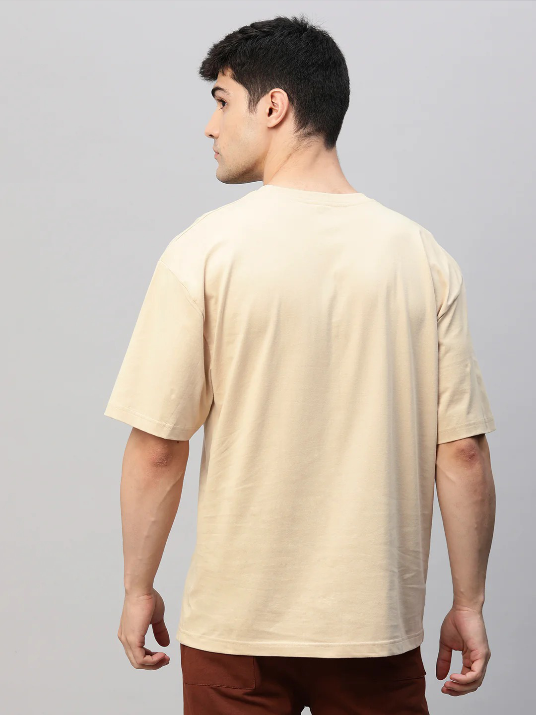 STOP BELIEVING OVERSIZED TEE – Beige Cosmic Irony & Alien Truths