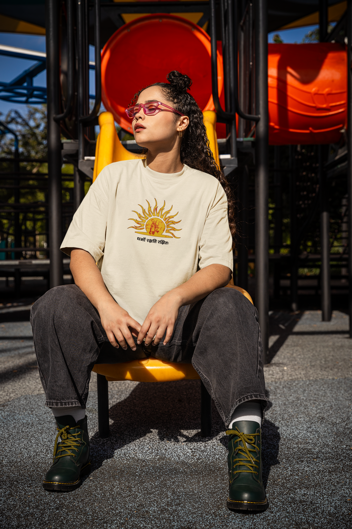 Dharmo Rakshati Rakshitah Beige Oversized T-Shirt – Sun Symbol & Royal Legacy Art
